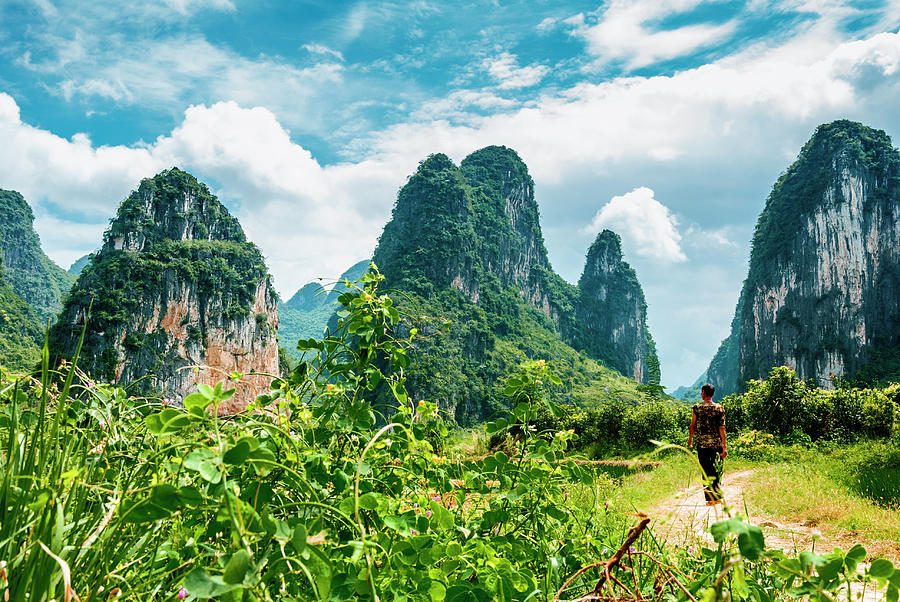 Karst mountains and  rural scenery #40 Photograph by Carl Ning