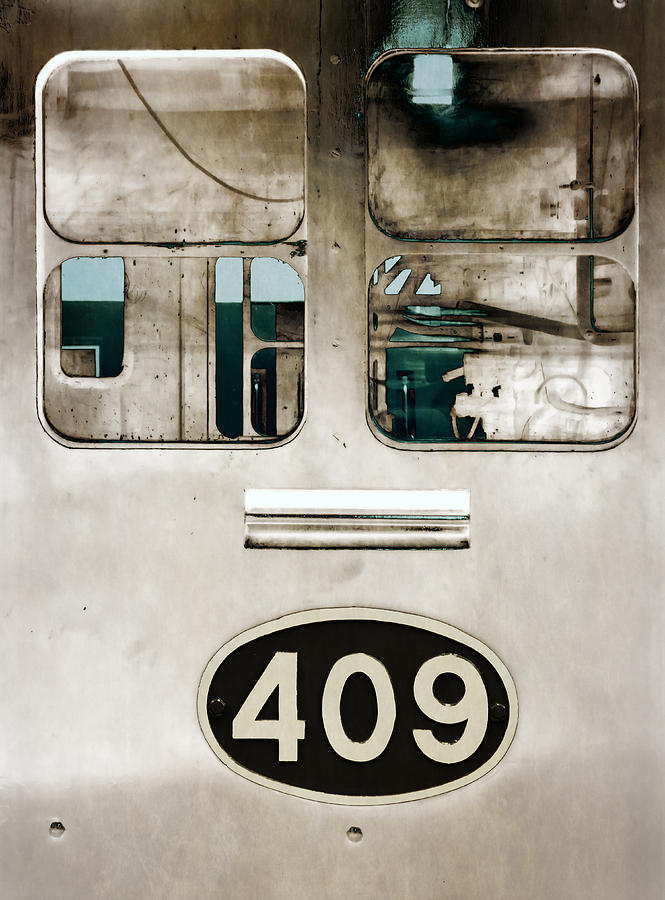 409 Photograph by Wayne Sherriff