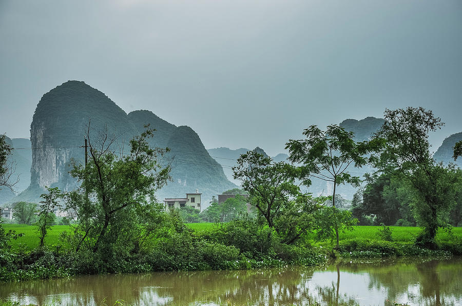 The beautiful karst rural scenery #41 Photograph by Carl Ning