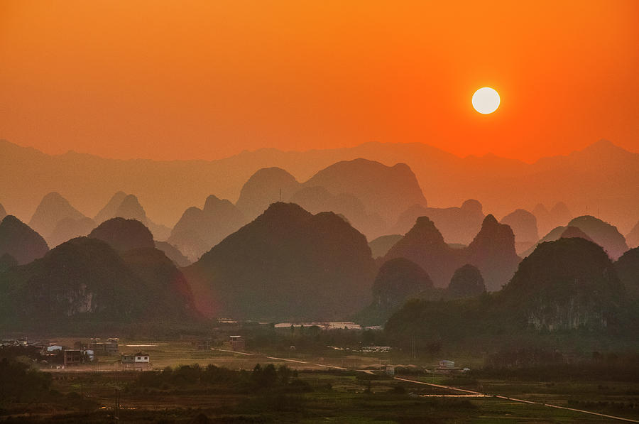 Karst mountains scenery in sunset #46 Photograph by Carl Ning