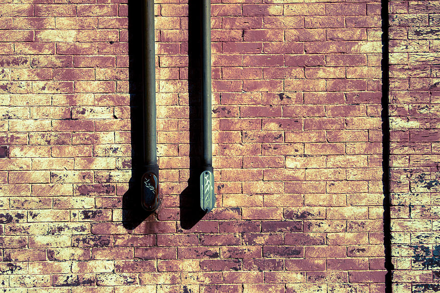 Brick wall and old iron Photograph by Vintage Pix