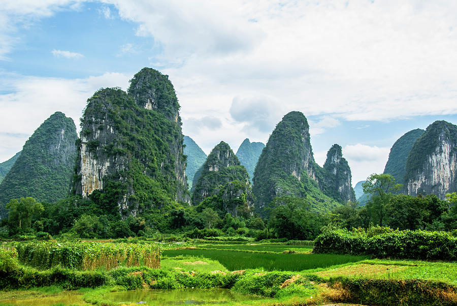 Karst mountains and  rural scenery #47 Photograph by Carl Ning