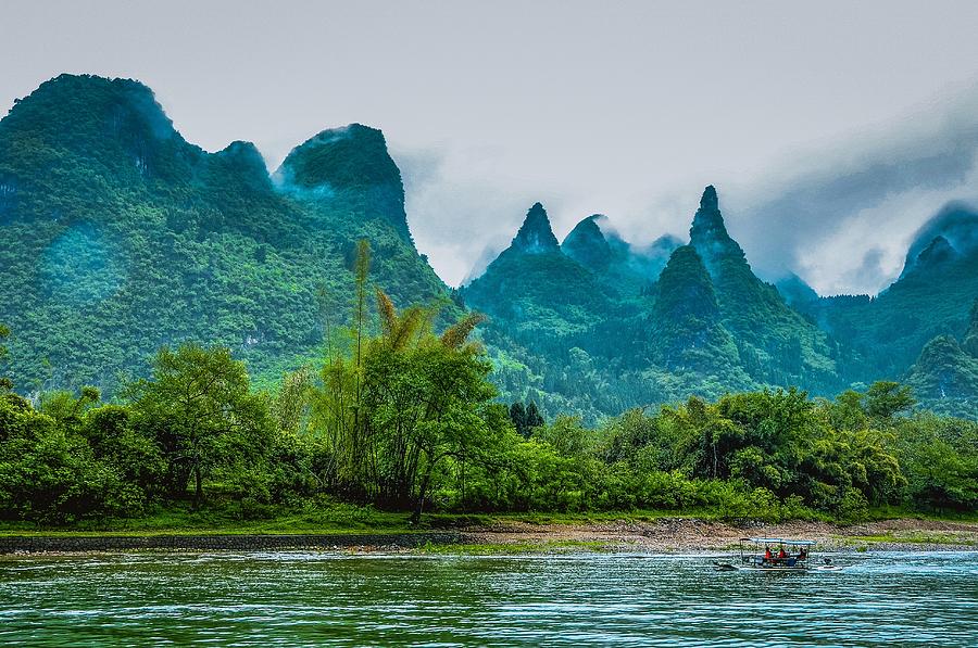 Karst mountains and Lijiang River scenery #48 Photograph by Carl Ning