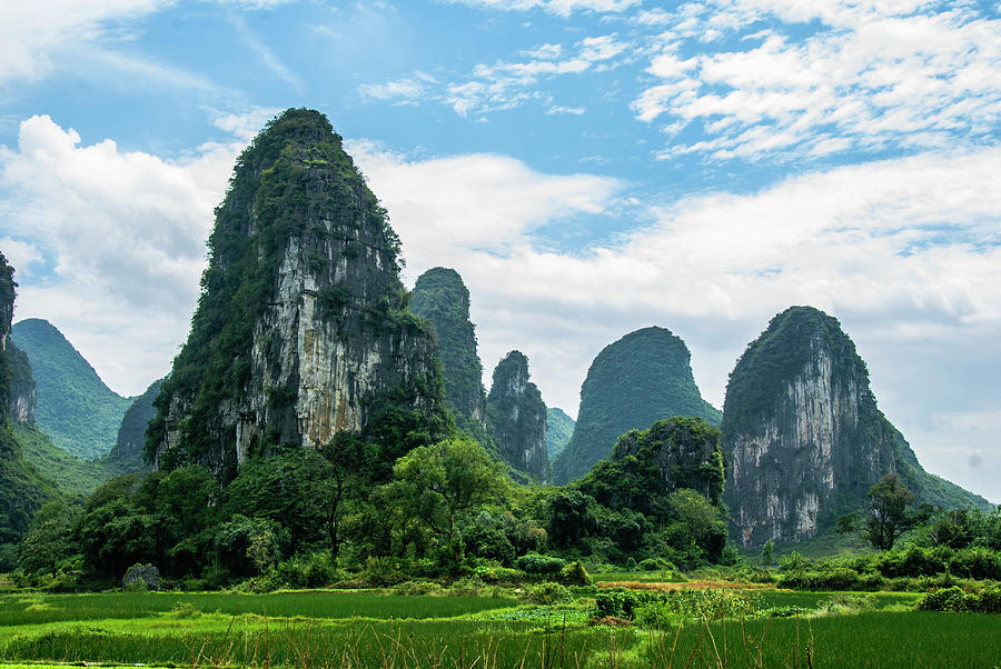 Karst mountains and  rural scenery #49 Photograph by Carl Ning