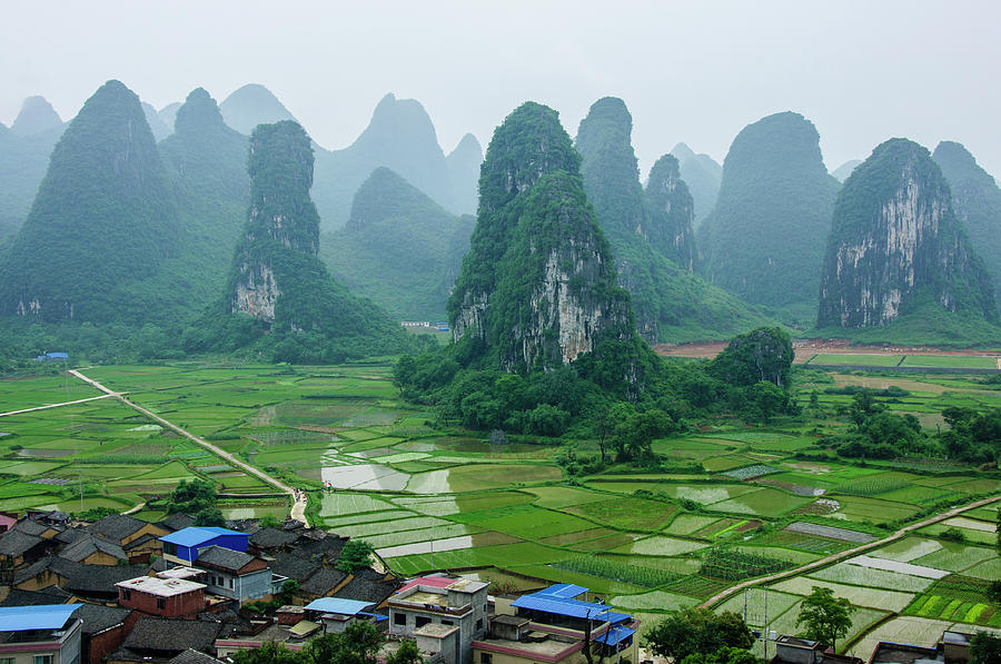 The beautiful karst rural scenery in spring #49 Photograph by Carl Ning