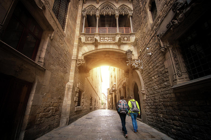 Bridge between buildings in Barri Gotic quarter of Barcelona #5 Photograph by Anek Suwannaphoom