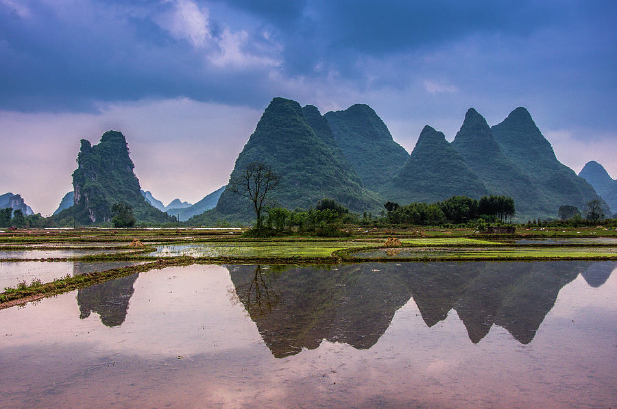 Karst mountains and rural scenery #5 Photograph by Carl Ning