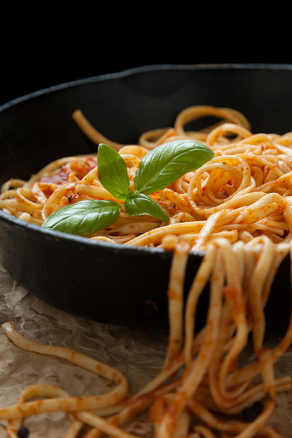 Linguine With Basil And Red Sauce In Cast Iron Pan Photograph