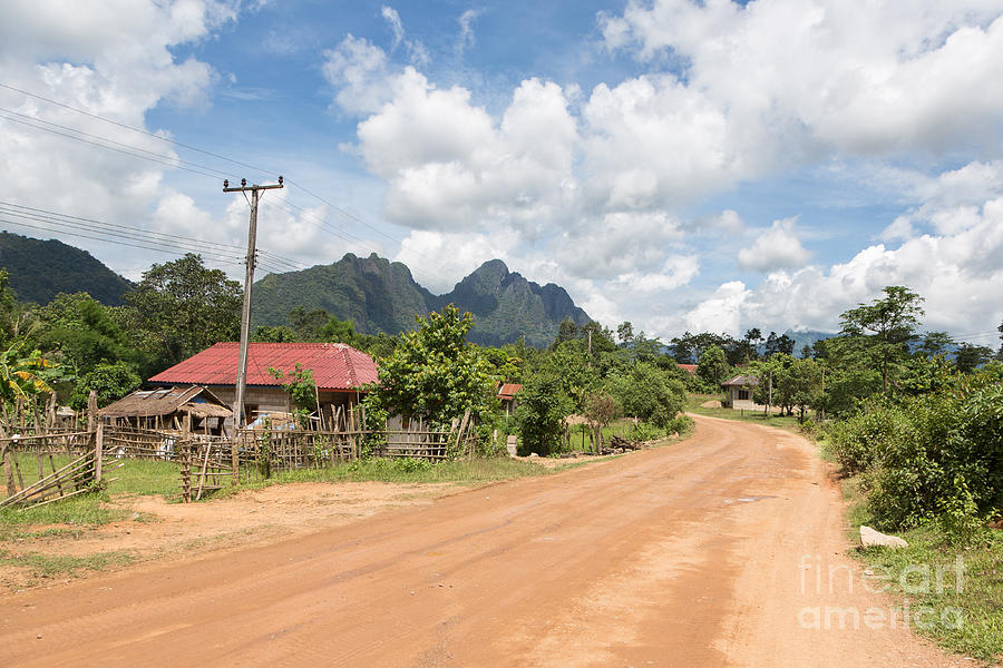 On the road in Laos #5 Photograph by Didier Marti