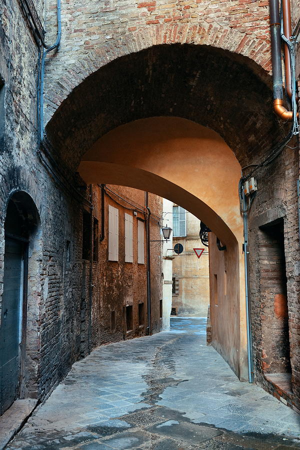 Siena street archway #5 Photograph by Songquan Deng