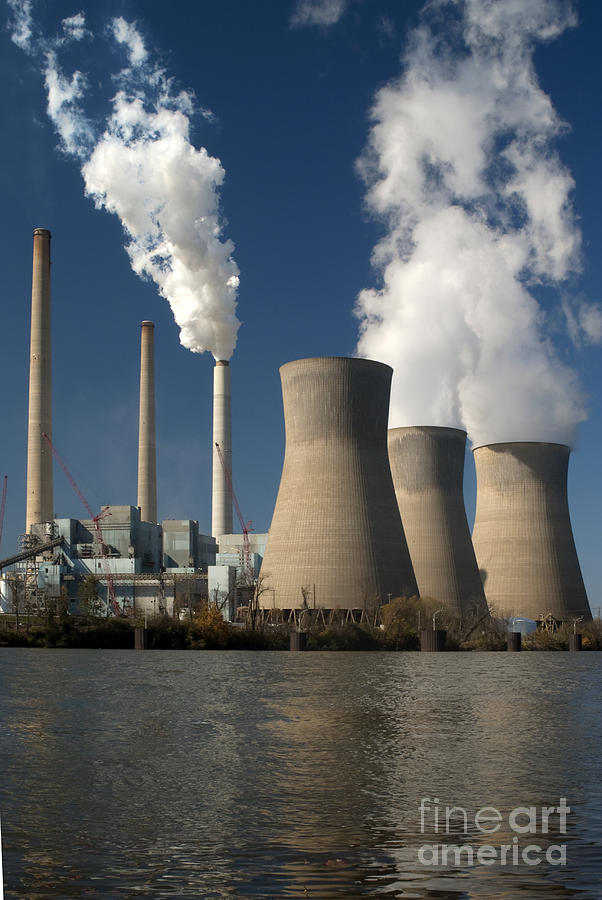 Three cooling towers at a power plant. #5 Photograph by Anthony Totah