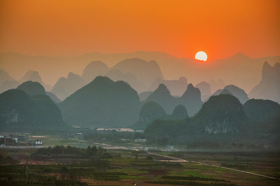 Karst mountains scenery in sunset #51 Photograph by Carl Ning