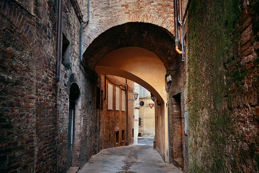 Siena street archway #6 Photograph by Songquan Deng