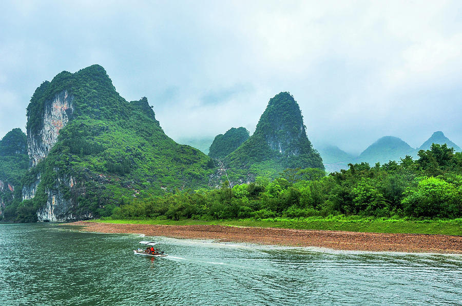 The beautiful karst mountains and Lijiang river scenery Photograph by ...