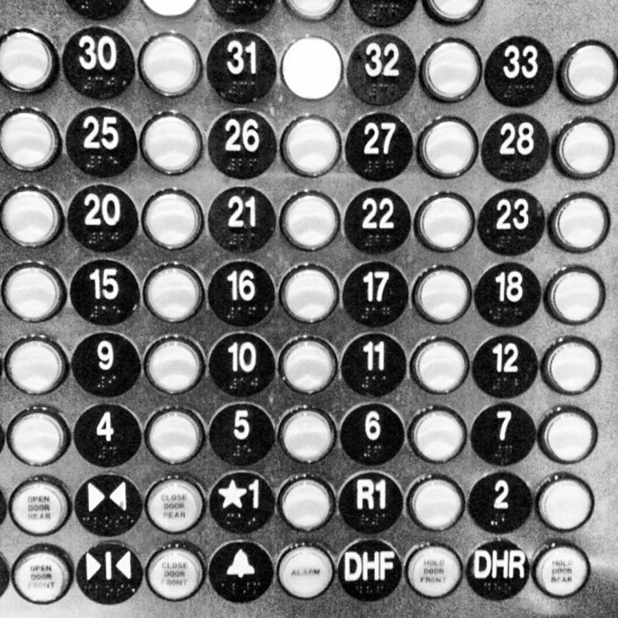 Black And White Photograph - Elevator Buttons by Sean Wray