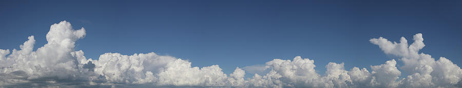 Fluffy clouds 1 Photograph by Les Cunliffe
