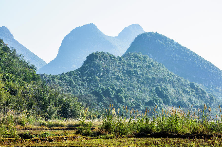 Karst mountains scenery in winter #7 Photograph by Carl Ning