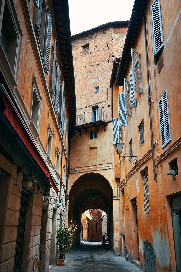 Siena street archway #7 Photograph by Songquan Deng