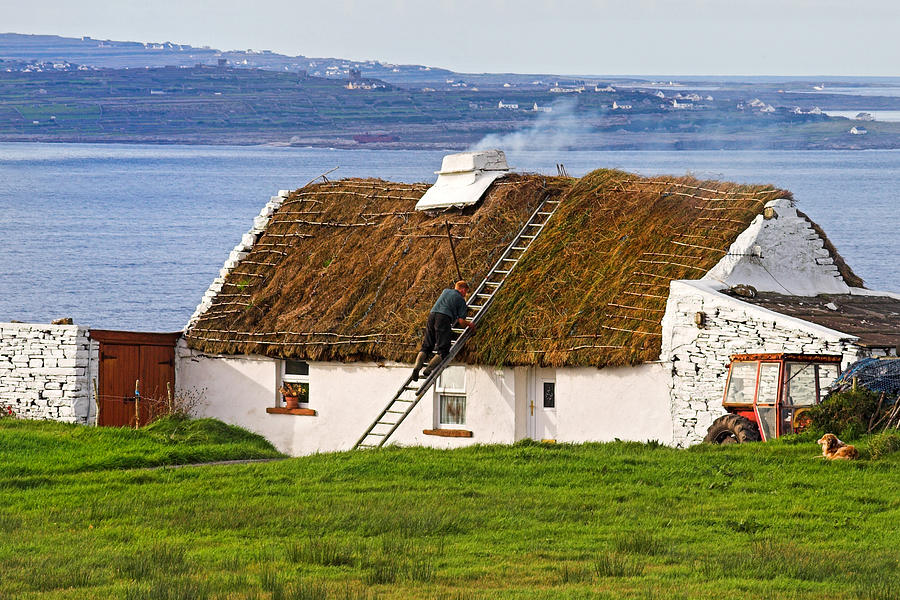 Traditional Thatch roof cottage Ireland Photograph by Pierre Leclerc Photography