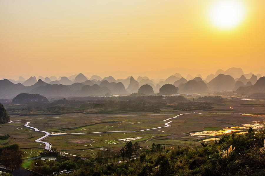 Karst mountains scenery in sunset #9 Photograph by Carl Ning