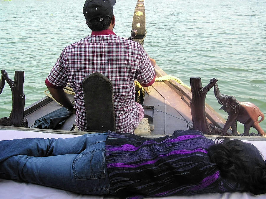 Lady sleeping while boatman steers #9 Photograph by Ashish Agarwal