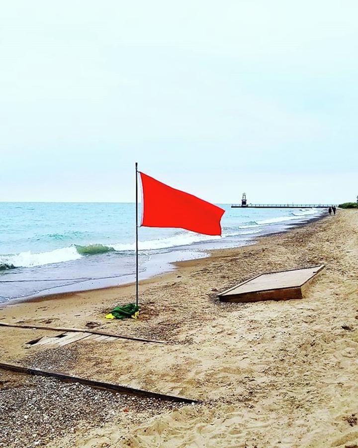 Red Flag Day  Photograph by Todd Janousek