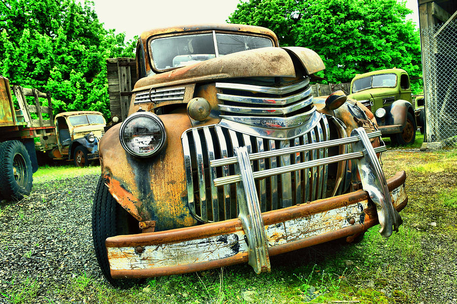 A beautiful old rust bucket Photograph by Jeff Swan