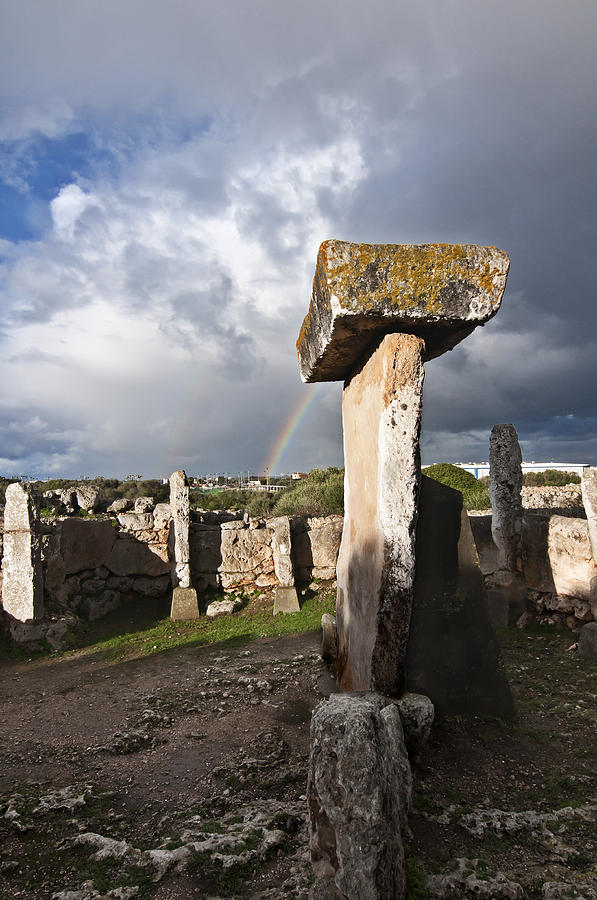 A beautiful rainbow in a cloudy day in human settlement of bronze age Photograph by Pedro Cardona Llambias