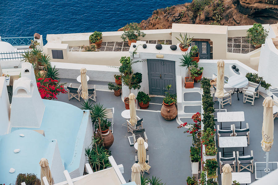 A beautiful terrace in Santorini Photograph by Daniel Pazmany - Fine ...