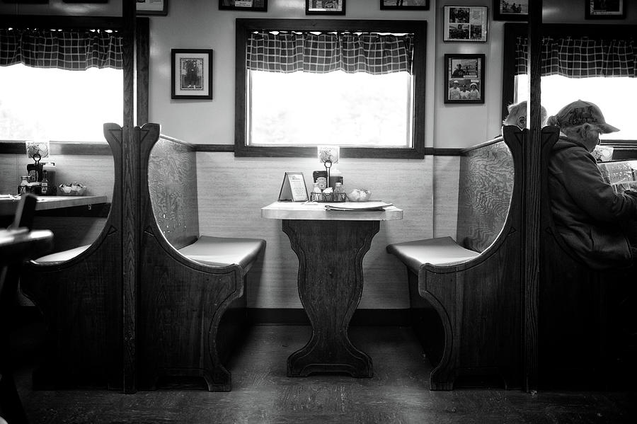 Black And White Photograph - A Booth In Moodys Diner by Rick Berk