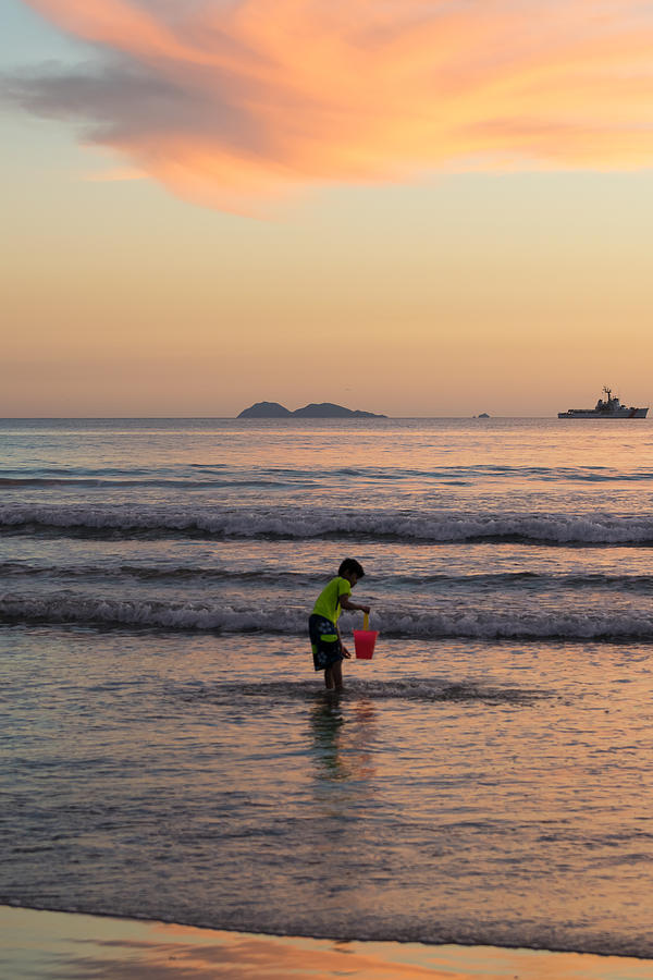 A Bucket of Ocean Water Photograph by Robert VanDerWal