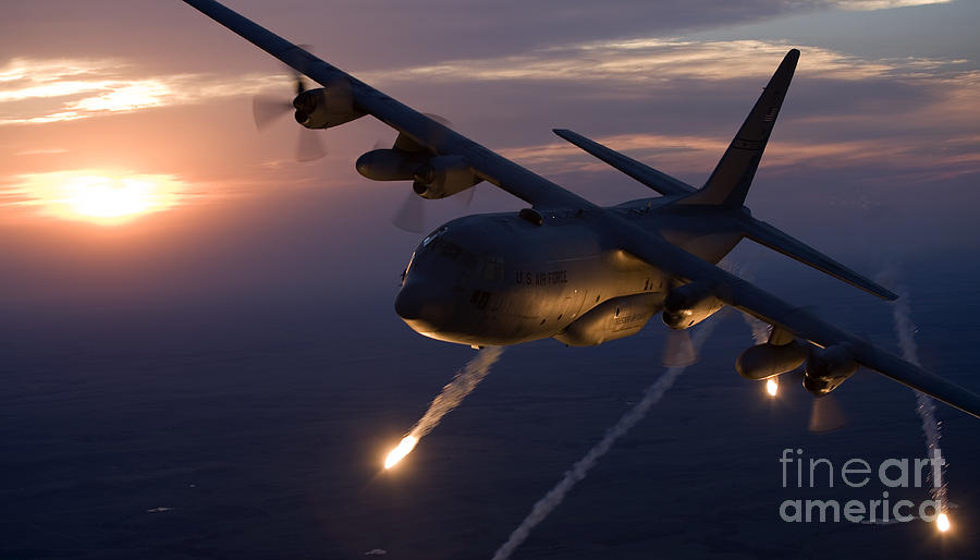 A C-130 Hercules Releases Flares Photograph by HIGH-G Productions