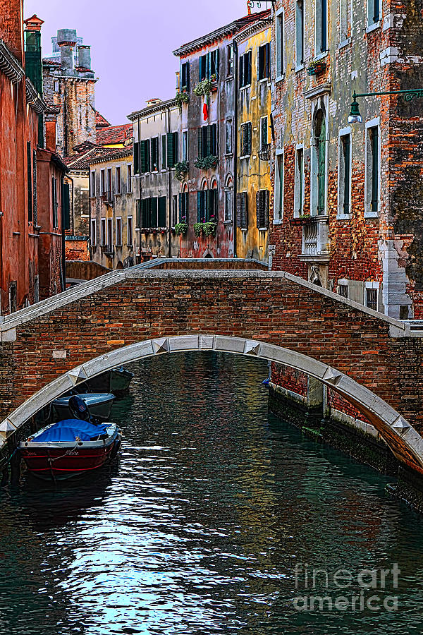 A Canal in Venice Photograph by Tom Prendergast