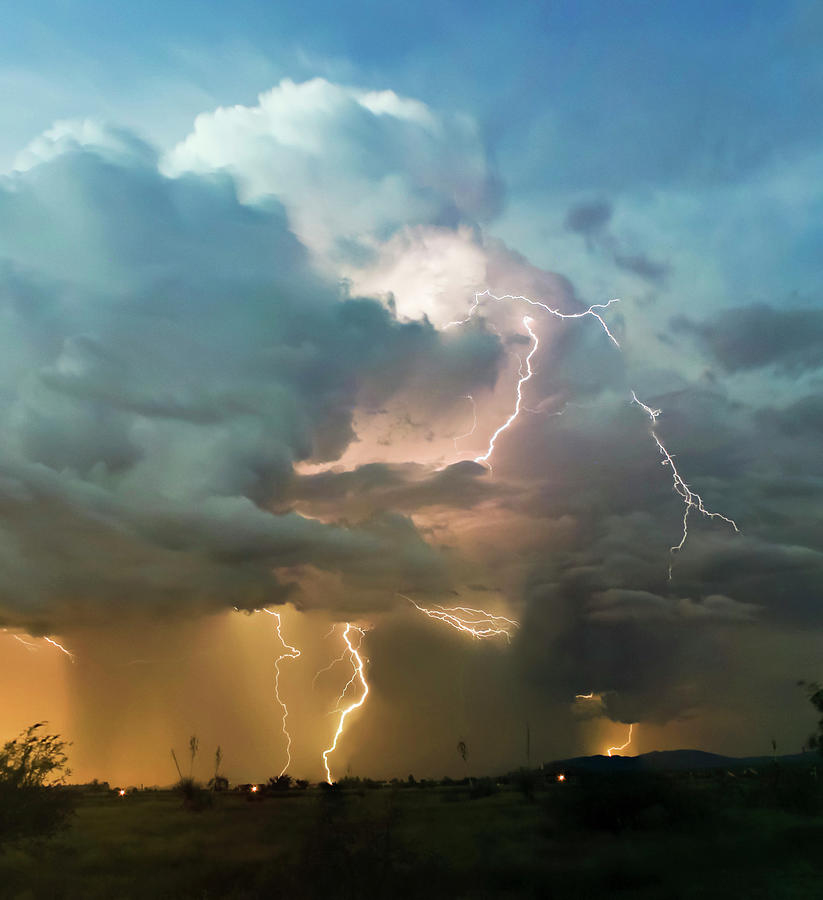 A Chaotic Thundercloud With Lightning Strikes Within Photograph
