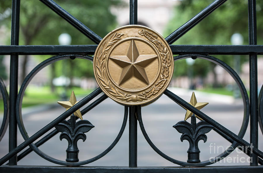 Lone Star Photograph - A close up of a gate at the Texas State Capitol displaying the national coat of arms of the Republic of Texas by Dan Herron