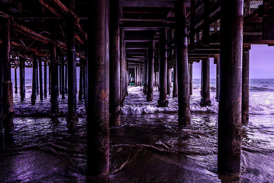 A Cloudy Day Under The Pier Photograph by Gene Parks