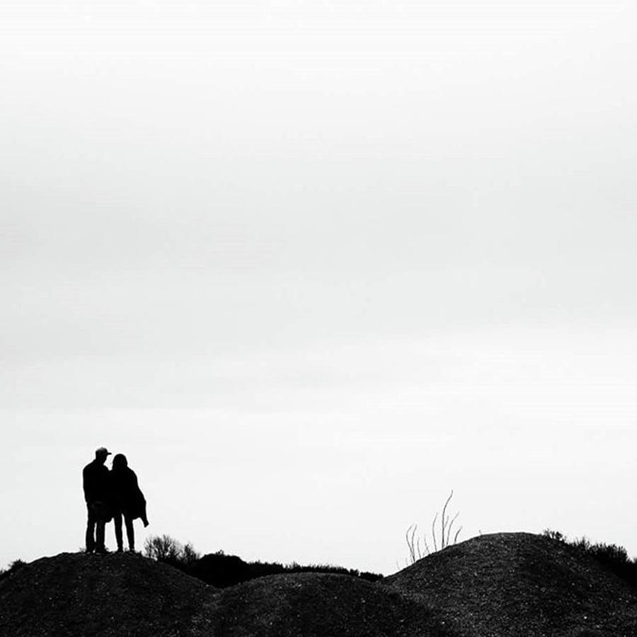 A Couple Looking At Amerika Mines Near Photograph by Eva Dobrikova