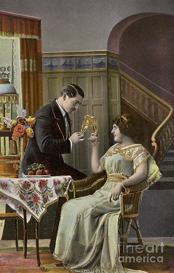 A couple toasting each others wine glasses Photograph by English School