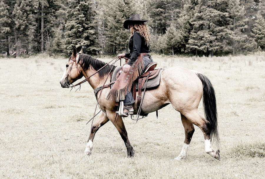 A Cowgirl And Her Horse Photograph by Athena Mckinzie