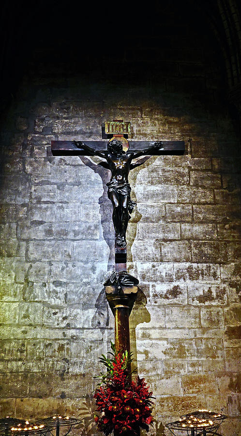 A Crusifix Inside Notre Dame In Paris, France Photograph by Rick Rosenshein