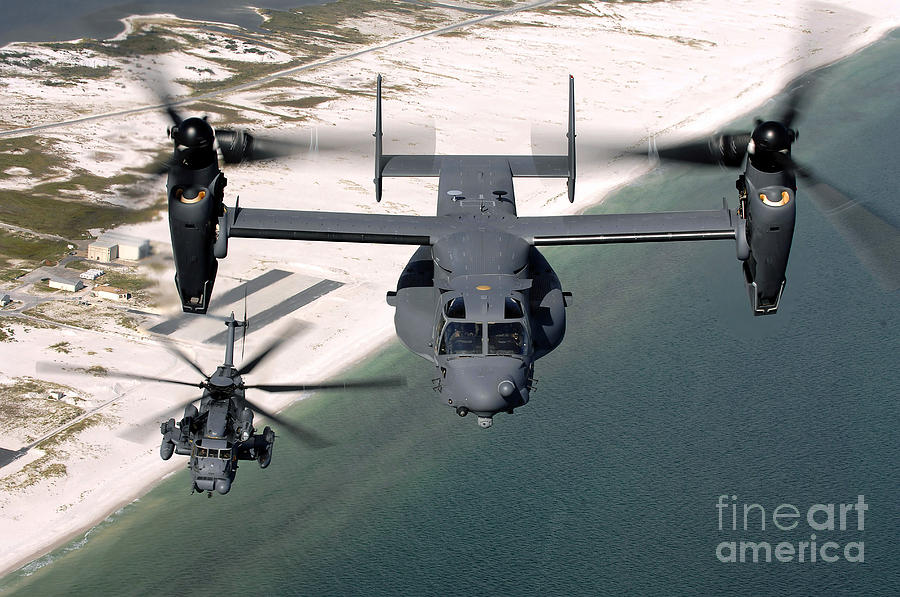 Osprey Photograph - A Cv-22 Osprey And An Mh-53 Pave Low by Stocktrek Images