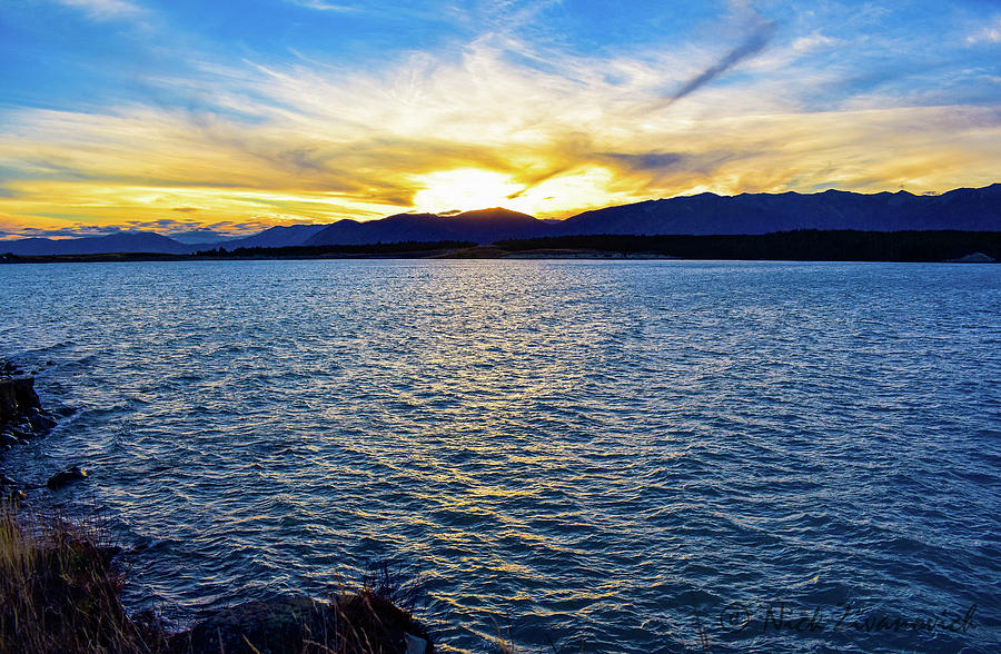 A Dramatic Sunset Over Lake Pukaki Photograph By Nick Zivanovich