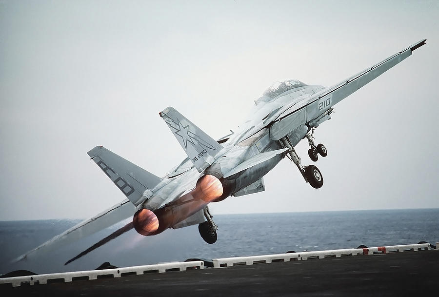 Airplane Photograph - A F-14a Tomcat Aircraft Is Launched by Stocktrek Images