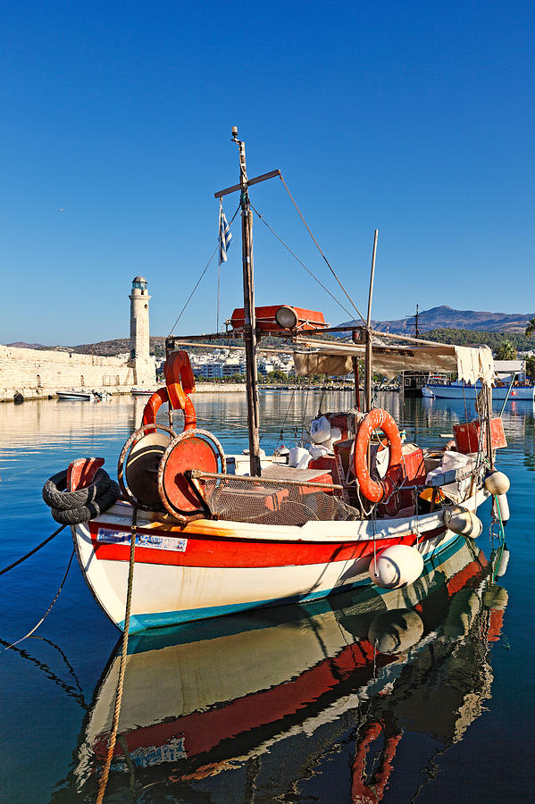 A fishing boat at Rethymno in Crete - Greece Photograph by Constantinos Iliopoulos
