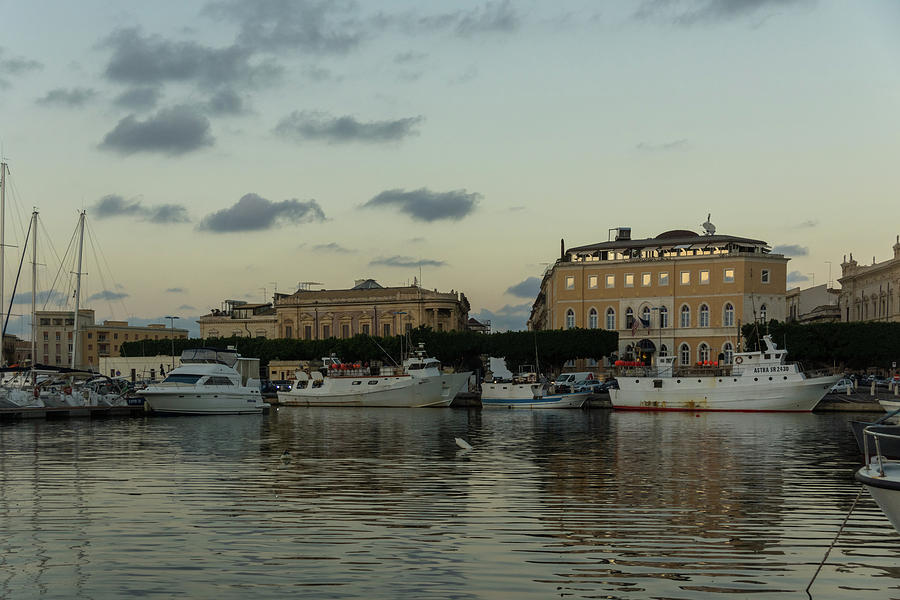 A Fishing Port Surrounded by Palaces - Reflecting on Syracuse Sicily Photograph by Georgia Mizuleva