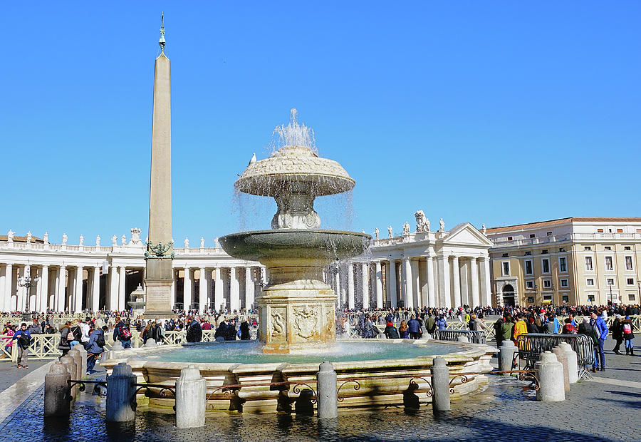 A Fountain And The Vatican Obelisk Within St. Peters Square In The Vatican City  Photograph by Rick Rosenshein