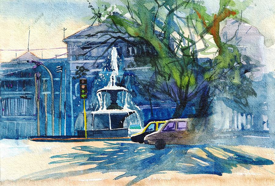 A fountain with an old building in the background by Makarand Joshi A fountain with an old building in the background by Makarand Joshi