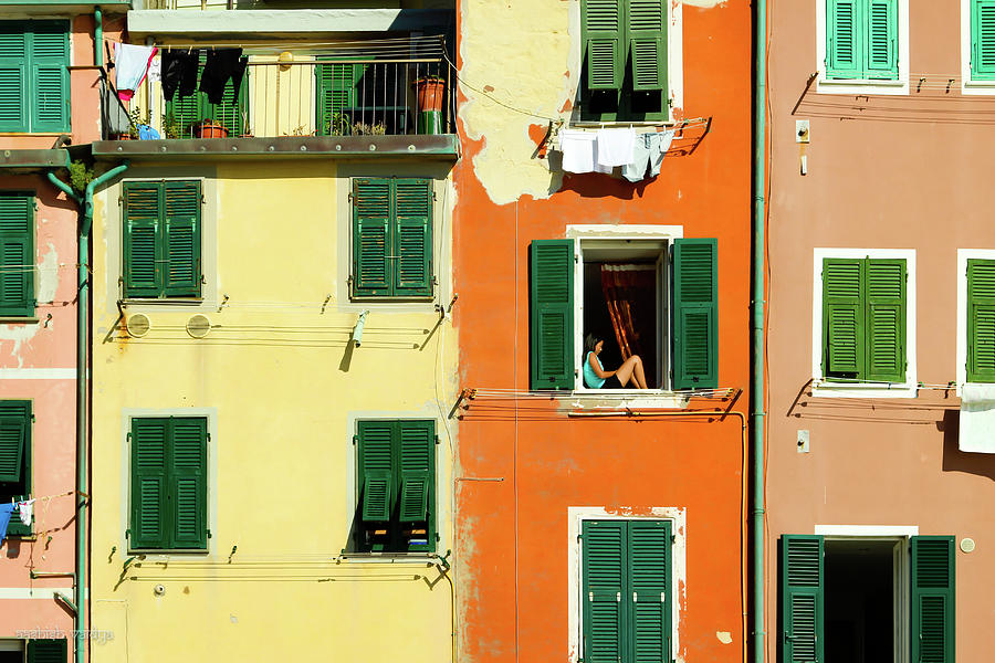 A girl on a window sill, Italy Photograph by Aashish Vaidya