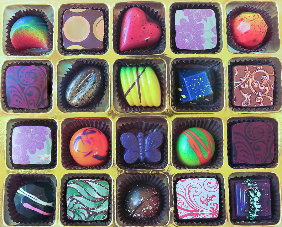 A Gold Tray Of Hand Crafted Chocolates Photograph
