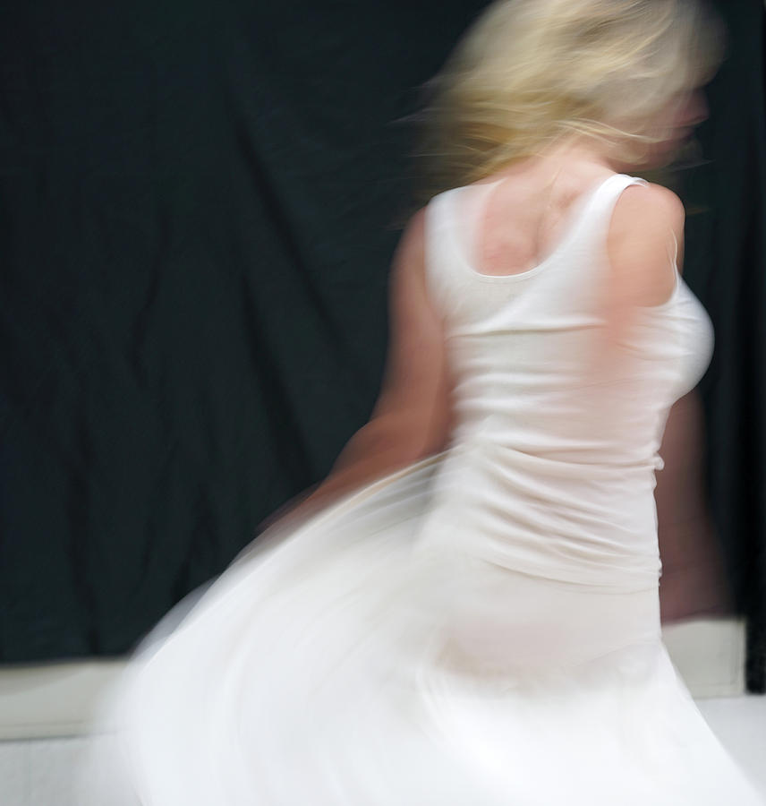 A Dance in White #1210 Photograph by Raymond Magnani
